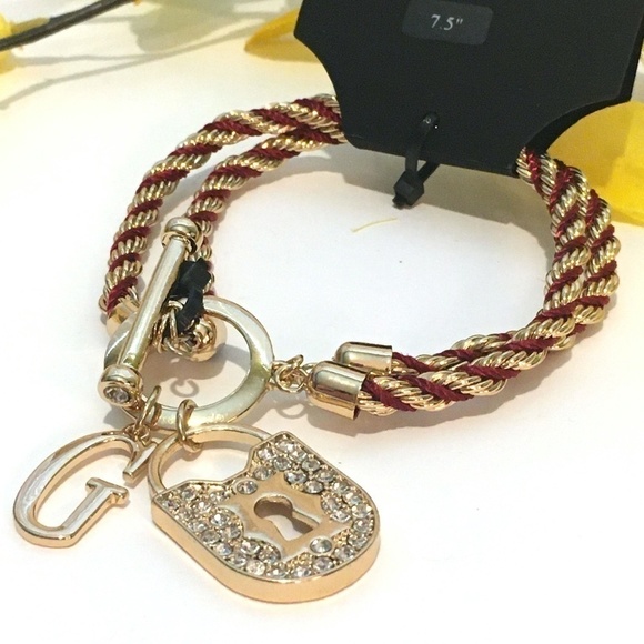 𝅺3/$29! GUESS Twisted Rope Bracelet with Lock - Picture 3 of 9
